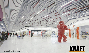 Designer rail ceiling in the shopping center "Caravan" (+29 photo + video)