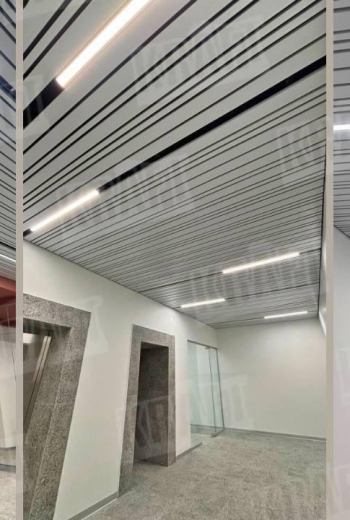 Cube-Shaped Rail Suspended Ceiling KRAFT in Modern Interiors: Design That Works for Comfort and Trust